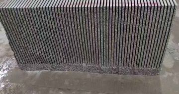绵阳芝麻白毛板荒料切割